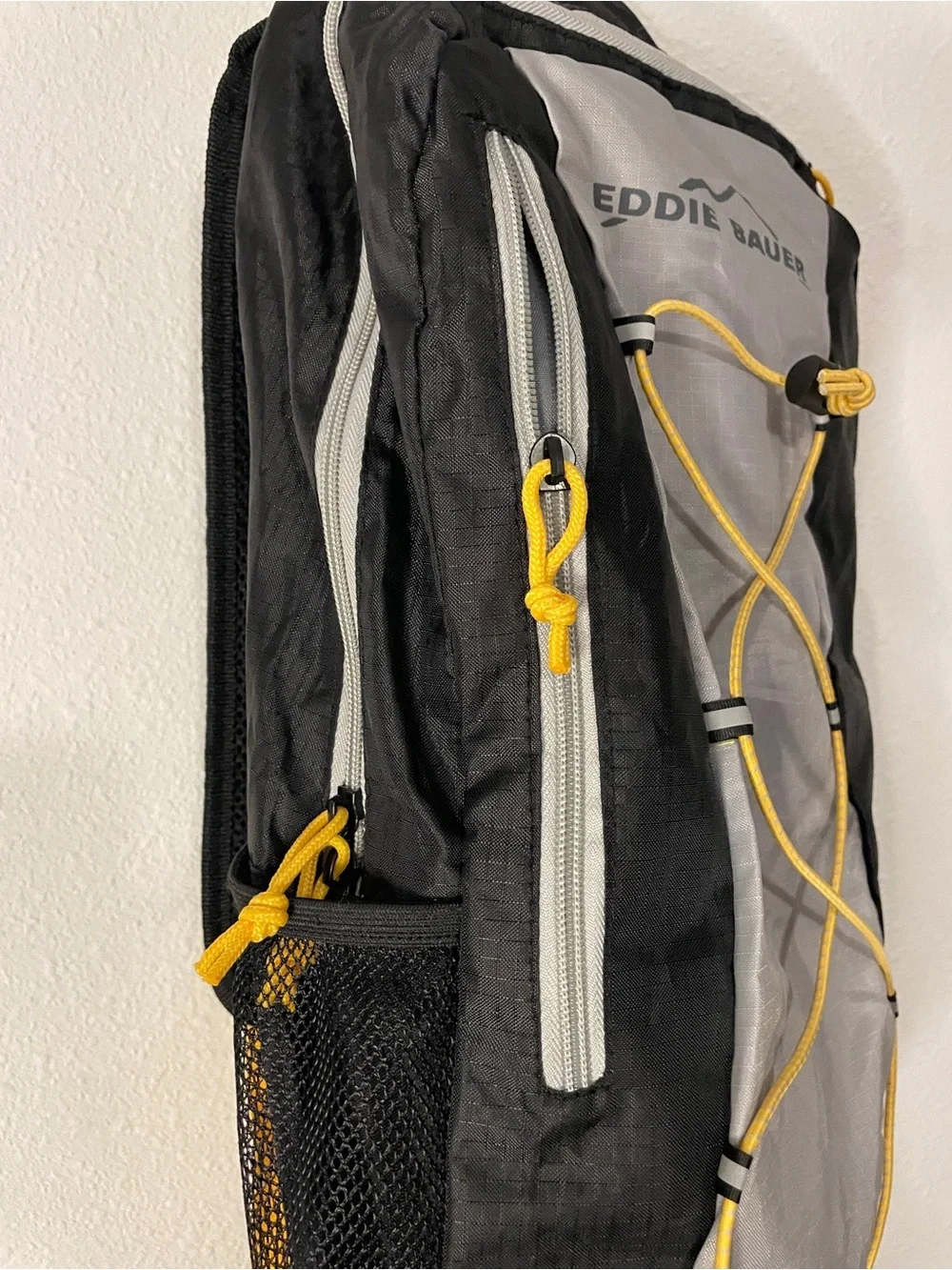 New Eddie Bauer Black and Gray Backpack with Yellow Accents